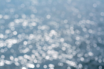 Blurred view of seascape on sunny day, bokeh effect