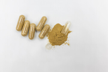Open soft capsule vitamins on white background