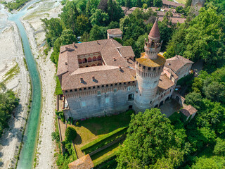 Aerial view of Rivalta castle on the Trebbia river, Piacenza province, Emilia-Romagna, Italy. 06-16-2022
It is an imposing fortified complex with a cylindrical tower