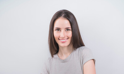 portrait of a beautiful young woman with a beautiful white smile 