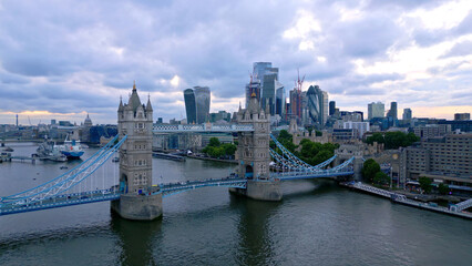 Famous Tower Bridge and City of London in the evening - aerial view