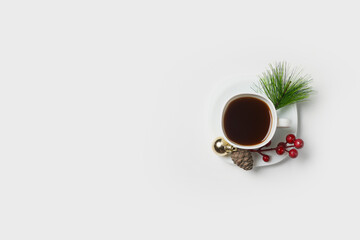 Cup of espresso coffee. Coffee cup with Christmas ornaments and decoration on white background. Minimalism