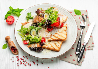 Healthy Grilled Chicken Caesar Salad with Cheese and Croutons