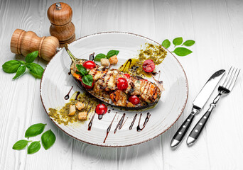 Grilled eggplants, stuffed with cheese and cherry tomatoes