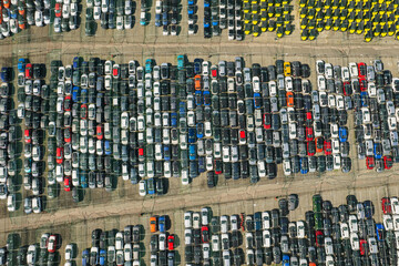 Aerial view of new cars lined up at the port for import and export