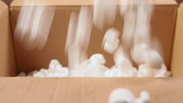 Polystyrene foam in cardboard box