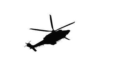 Fototapeta na wymiar Side view from the bottom up at a silhouette of a flying AW139 helicopter, photo edited to silhouette 
