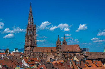 Fototapeta na wymiar View over the roofs of the old town with Freiburg Cathedral, Freiburg im Breisgau, Baden-Wuerttemberg, Germany