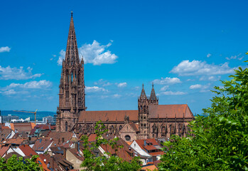 View over the roofs of the old town with Freiburg Cathedral, Freiburg im Breisgau,...