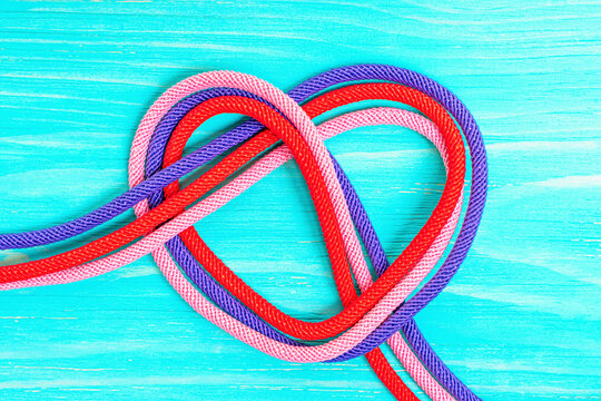 Multicolored cords twisted into a heart shape