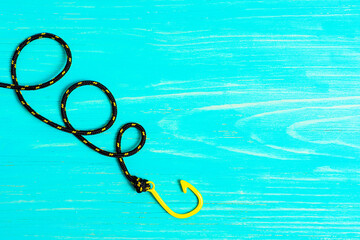Nautical style fishhook bracelet on blue