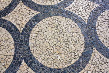 Traditional pattern cobblestone pavement (calada portuguesa) in Porto, Portugal