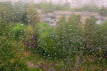 on photo rain drops on a window glass