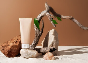 Cosmetic skin care product body lotion, shampoo, face cream or mask with pieces of rock, sand and...