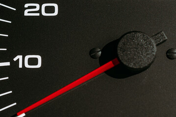 Car speedometer,Car dashboard,Arrow of odometer,tachometer.Close up.Selective focus.