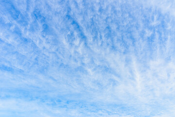 Summer blue sky white clouds light white background. Beauty clear cloudy in summer day bacground.landscape in environment day horizon skyline view spring windy day.