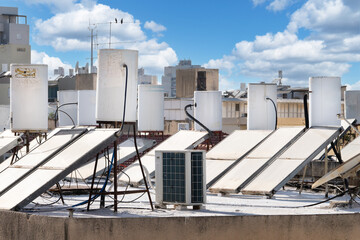 A lot of solar water heating systems installed on the roof of the house in Israel © Georgy Dzyura