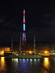 City night landscape. Night view of the Volkhov River, the TV tower and the frigate 