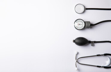 Black sphygmomanometer and medical equipment blood pressure monitor isolated on white background....
