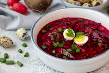 Cold beetroot soup with vegetables, eggs, herbs. Traditional cuisine. Healthy food. Vegetarian food.