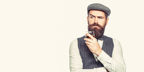 Bearded gentleman drink cognac. Sipping finest whiskey. Portrait of man with thick beard