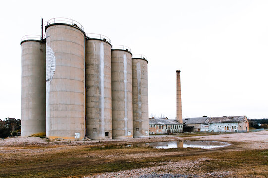 The large cement storage silos at the now closed Portland Cement Works