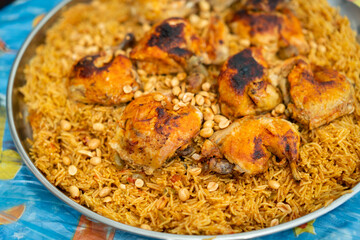 chicken Kabsa - mixed rice dishes that originates in Yemen. Middle eastern food. High quality photo