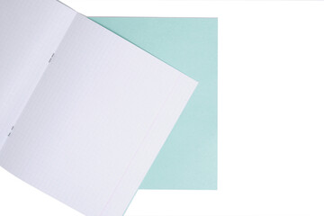 School math notebook in check on white background.