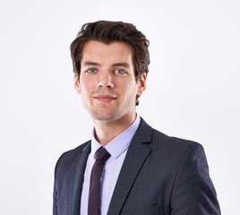 Corporate confidence. Studio shot of a handsome young businessman against a white background.