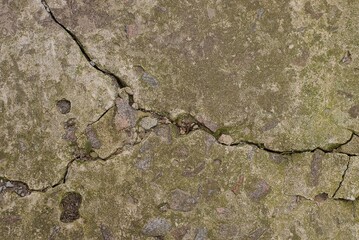 gray stone texture from an old cracked concrete wall