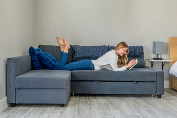 A Gorgeous Young Blonde Woman Enjoys Her Time At Home Alone In Her Apartment