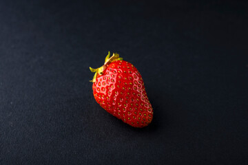 Strawberry isolated on black background