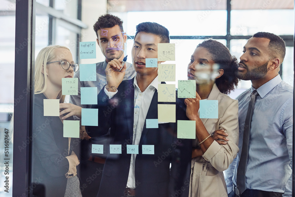 Aufkleber making everyone part of the process of success. shot of a group of young businesspeople having a bra