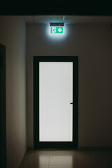 empty room with frame and exit sign
