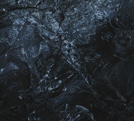 Dark marble. Black texture. Stone background. Silver Wall. Rock background. Rock texture. Rock pile. Paint spots. Rock surface with cracks. Grunge Rough structure. Abstract texture.