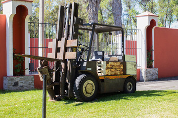 old yellow lift truck in a train museum, Mexico
