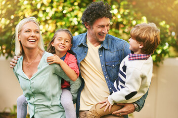 Making some fun memories together. Cropped shot of a happy family spending quality time together outside.