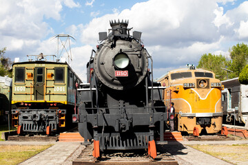 Fototapeta premium black old mexican train locomotive in museo del ferrocarril, Puebla, railway museum, Mexico