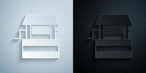 Paper cut Well icon isolated on grey and black background. Paper art style. Vector