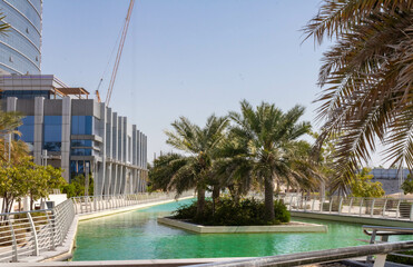 Al Reem Central park with seawater canals and modern buildings in Abu Dhabi