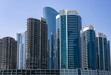 Obraz na płótnie Canvas Modern high-rise residential and office buildings on Al Reem island in Abu Dhabi, UAE