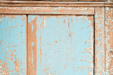 Distressed antique painted wood with cracked finish and worn weathered paint texture