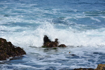 waves crashing on rocks