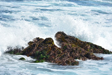 waves crashing on rocks