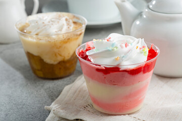 Desserts in the pot in banana and strawberry flavors.
