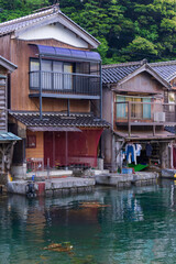 Fototapeta premium Lined up boathouses at Ine Town in Kyoto, Japan