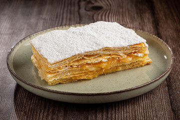Mille feuille dessert on the plate.