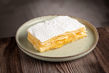 Mille feuille dessert on the plate.