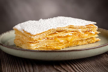 Mille feuille dessert on the plate.