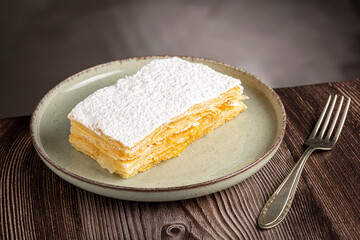 Mille feuille dessert on the plate.